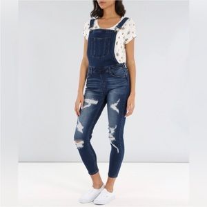 Kancan Dark Distressed Skinny Overalls